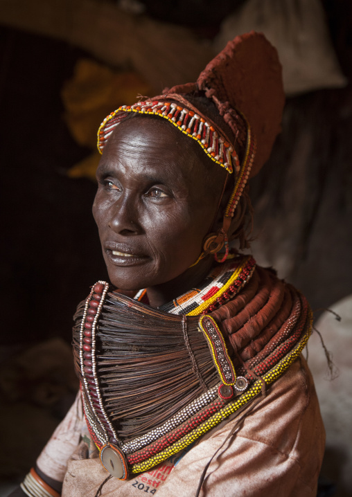Rendille tribeswoman wearing doko headdress and mpooro engorio necklace, Turkana lake, Loiyangalani, Kenya