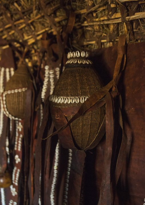 Borana tribe calabashes decorated with shells inside a hut, Chalbi desert, Marsabit, Kenya