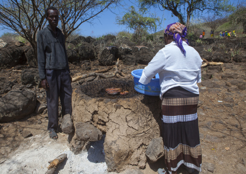 Smoke-drying fish, Baringo county, Baringo, Kenya