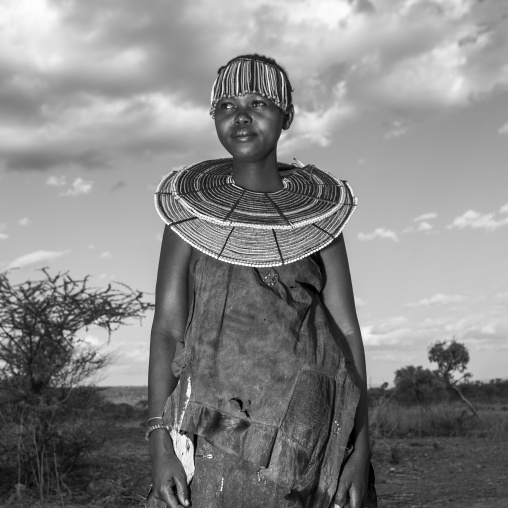 A pokot woman wears large necklaces made from the stems of sedge grass, Baringo county, Baringo, Kenya