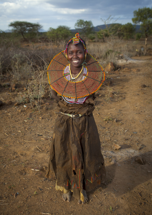 A pokot woman wears large necklaces made from the stems of sedge grass, Baringo county, Baringo, Kenya