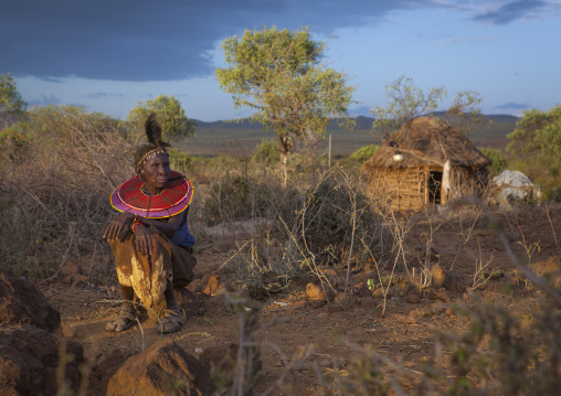 A pokot woman wears large necklaces made from the stems of sedge grass, Baringo county, Baringo, Kenya
