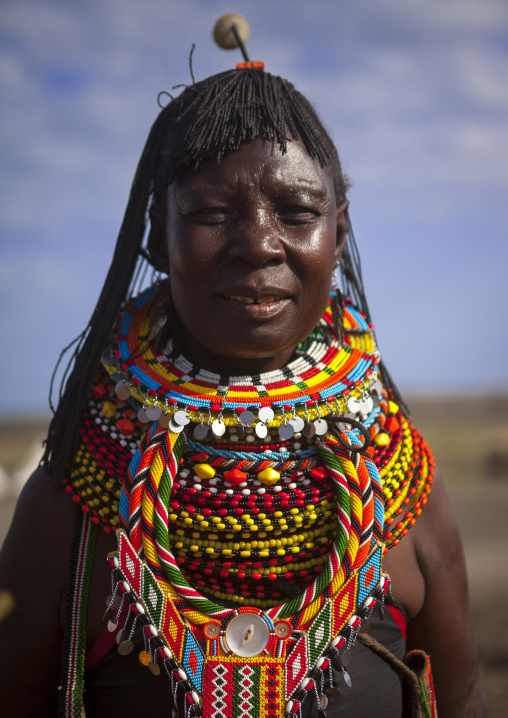 Turkana tribe woman with huge necklaces and ear rings, Turkana lake, Loiyangalani, Kenya