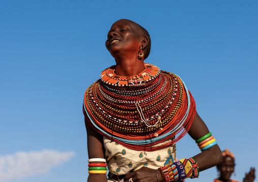 Samburu tribe woman with beaded necklaces dancing, Samburu County, Maralal, Kenya