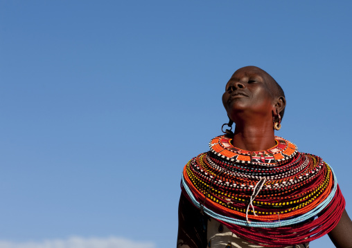 Samburu tribe woman with beaded necklaces dancing, Samburu County, Maralal, Kenya