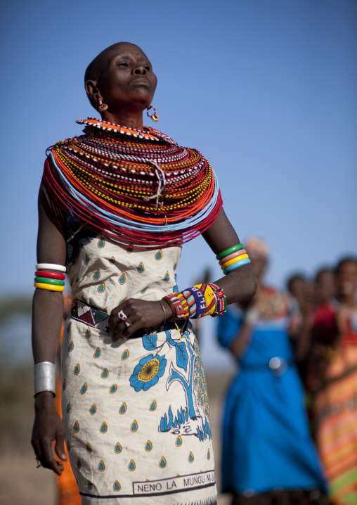 Samburu tribe woman with beaded necklaces dancing, Samburu County, Maralal, Kenya