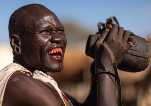 Samburu tribe man drinking cow blood, Samburu County, Maralal, Kenya