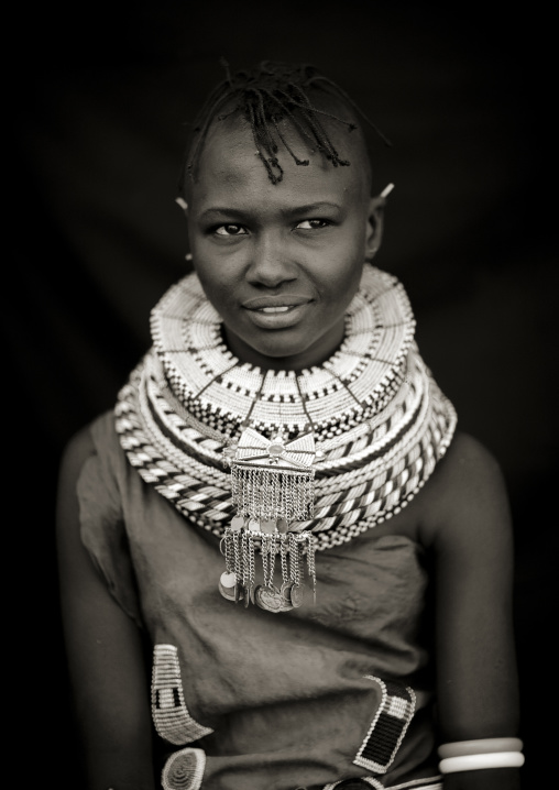 Turkana tribe woman with huge necklaces and earrings, Turkana lake, Loiyangalani, Kenya