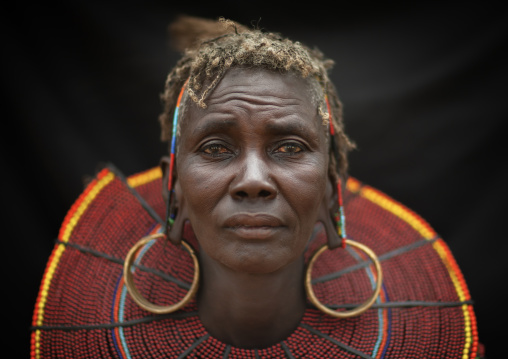 A pokot woman with a large necklace made from the stems of sedge grass, Baringo County, Baringo, Kenya