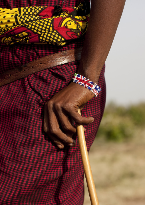 Maasai hand man with a beaded bracelet with united kingdom flag, Rift Valley Province, Maasai Mara, Kenya
