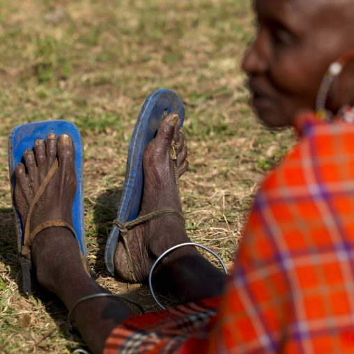 Maasai tribe woman wearing flip flops, Rift Valley Province, Maasai Mara, Kenya