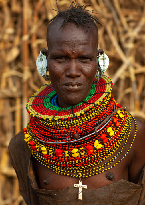 Portrait of a Turkana tribe woman with large earrings and necklaces, Rift Valley Province, Turkana lake, Kenya