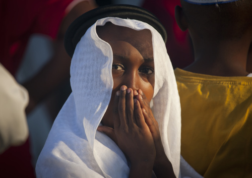 Young muslim boy during Maulid festival, Lamu County, Lamu, Kenya