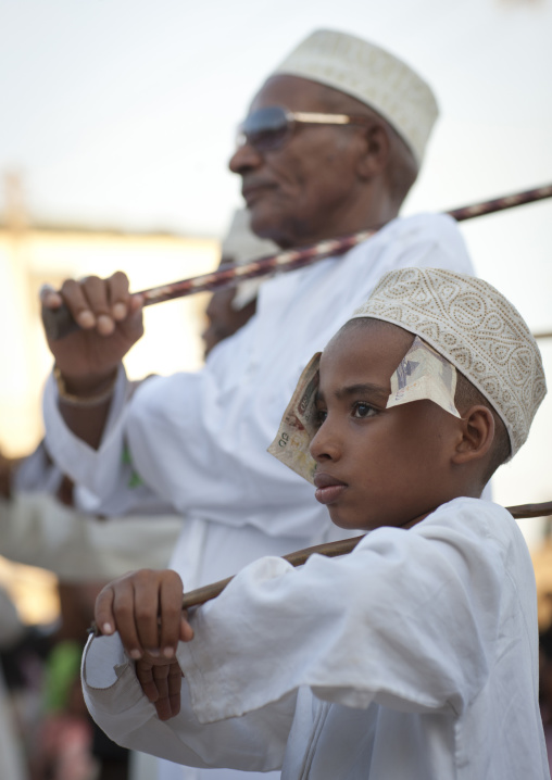 Muslim men celebrating the Maulid festival, Lamu County, Lamu, Kenya