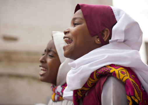 Young muslim girls singing during Maulid festival, Lamu County, Lamu, Kenya
