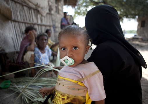 Young muslim woman wearing hijab with her daughter, Lamu County, Matondoni, Kenya