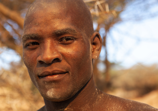 Man working in a coral stone quarry, Lamu County, Manda island, Kenya