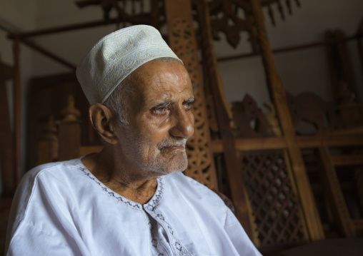 Old wood carver in his workshop, Lamu County, Lamu, Kenya