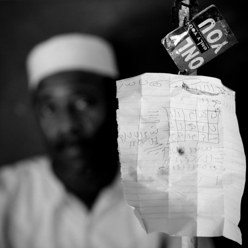 Kenyan witch doctor practicing black magic in his house, Lamu County, Lamu, Kenya