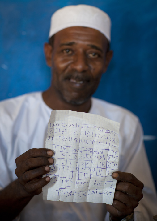 Kenyan witch doctor practicing black magic in his house, Lamu County, Lamu, Kenya
