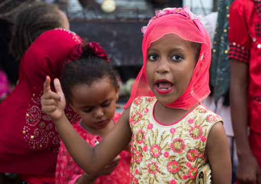 Young girls dressed in colorful way, Lamu county, Lamu town, Kenya
