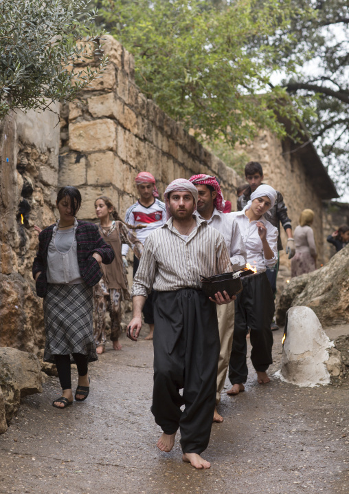 Yezedi Fakirs Lighting Sacred Fire In The Streets,  In Lalesh Temple, Kurdistan, Iraq