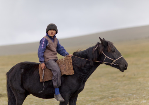 Young Boy Riding A Horse, Saralasaz Jailoo, Kyrgyzstan