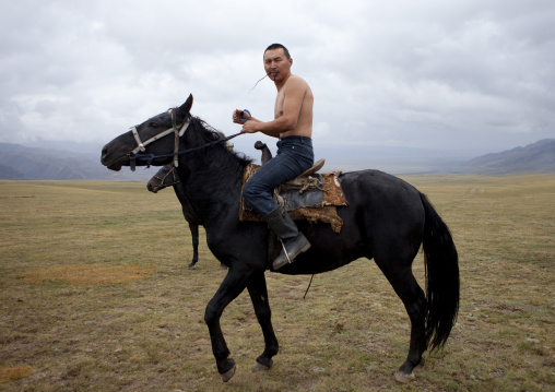 Bare Chest Horseman Ready For Horse Wrestling, Saralasaz Jailoo, Kyrgyzstan