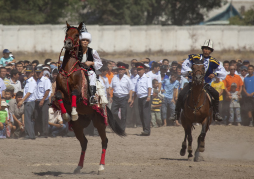 Man And Woman Playing A Horse Game On National Day, Bishkek, Kyrgyzstan