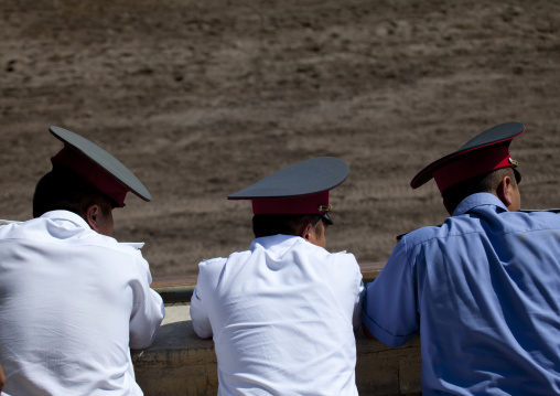 Policemen Watching The Horse Game Competition For National Day, Bishkek, Kyrgyzstan