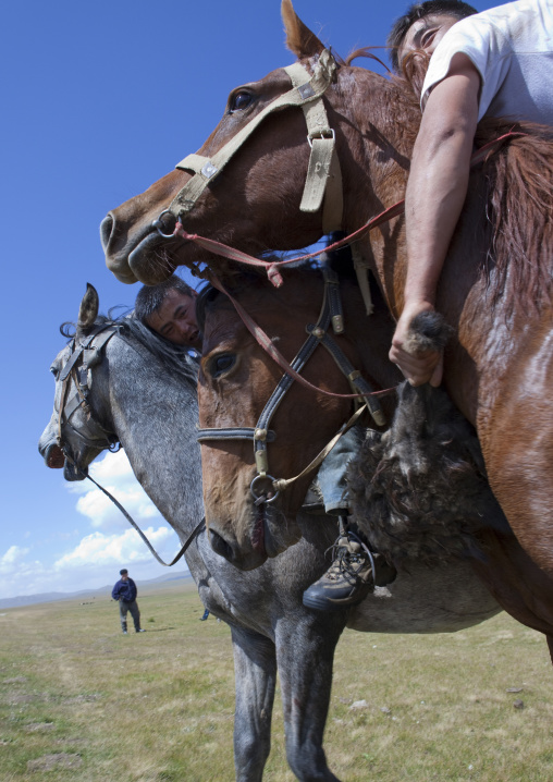 Horsemen Pulling On A Goat Carcass During A Horse Game, Saralasaz Jailoo, Kyrgyzstan