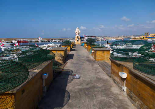 A statue of the virgin Mary sits in the fishing port, South Governorate, Tyre, Lebanon