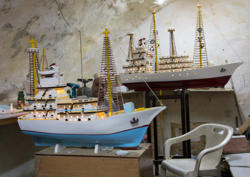 Man selling some model boats, South Governorate, Sidon, Lebanon