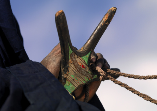 Tuareg man holding his saddle, Tripolitania, Ghadames, Libya