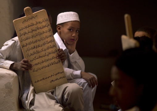 Children in a coranic school with a wooden board, Tripolitania, Ghadames, Libya