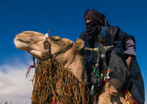 Tuareg man riding his camel, Tripolitania, Ghadames, Libya