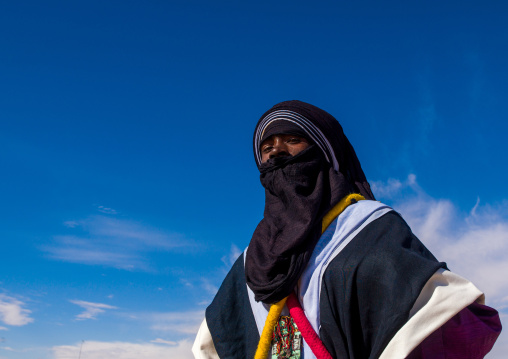 Portrait of a tuareg man  in traditional clothing against the sky, Tripolitania, Ghadames, Libya