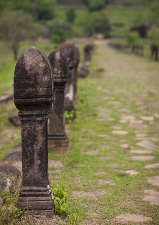 Raised stones lining lower level causeway leading to ancient khmer temple wat phu, Champasak, Laos