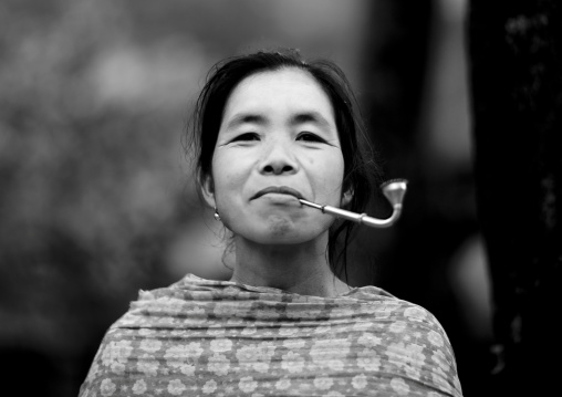 Khmu minority woman smoking pipe, Xieng khouang, Laos