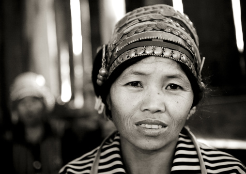 Akha minority woman with traditional headdress, Ban ta mi, Laos