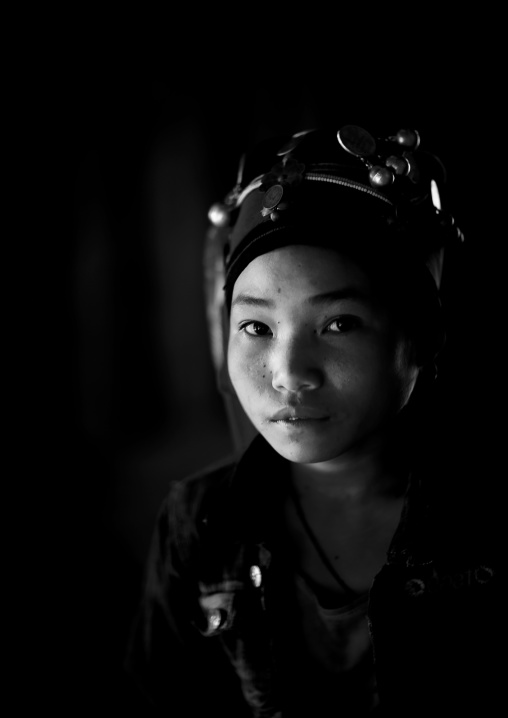 Akha minority woman with traditional headdress, Muang sing, Laos