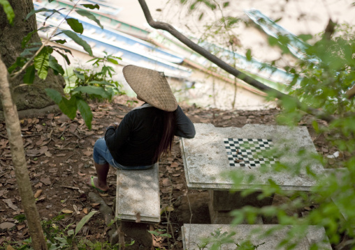 Woman relaxing on mekong river, Luang prabang, Laos