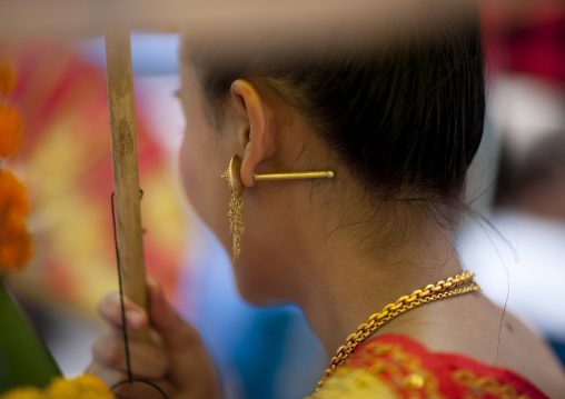 Girl in traditional clothing during pii mai lao new year celebration, Luang prabang, Laos