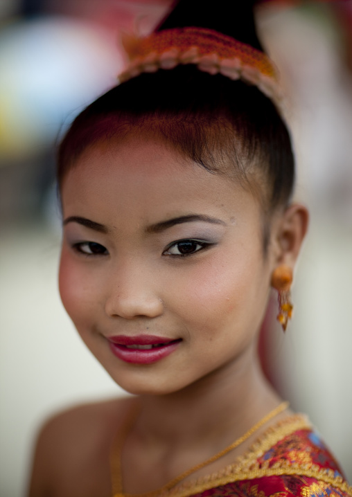 Girl in traditional clothing during pii mai lao new year celebration, Luang prabang, Laos