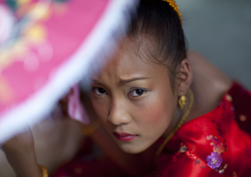 Girl in traditional clothing during pii mai lao new year celebration, Luang prabang, Laos