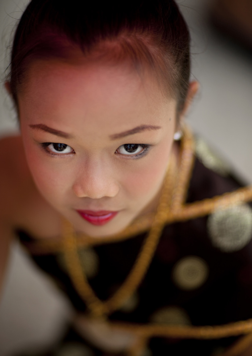 Girl in traditional clothing during pii mai lao new year celebration, Luang prabang, Laos
