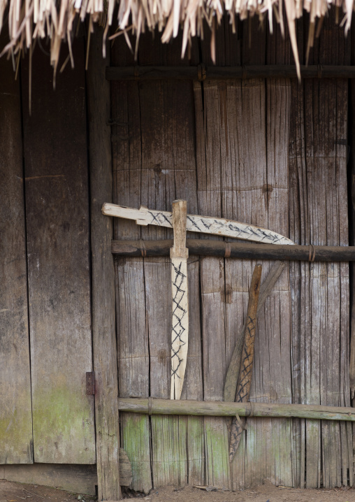 Hmong house with shaman warning sign, Luang prabang, Laos