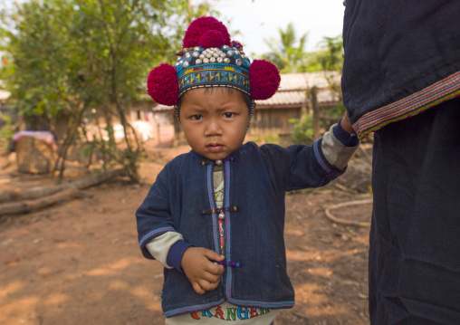 Yao minority kid with a traditional hat, Ban xay leck, Laos