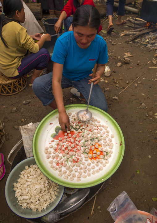 Women preparing meal for festivities, Louang namtha, Laos