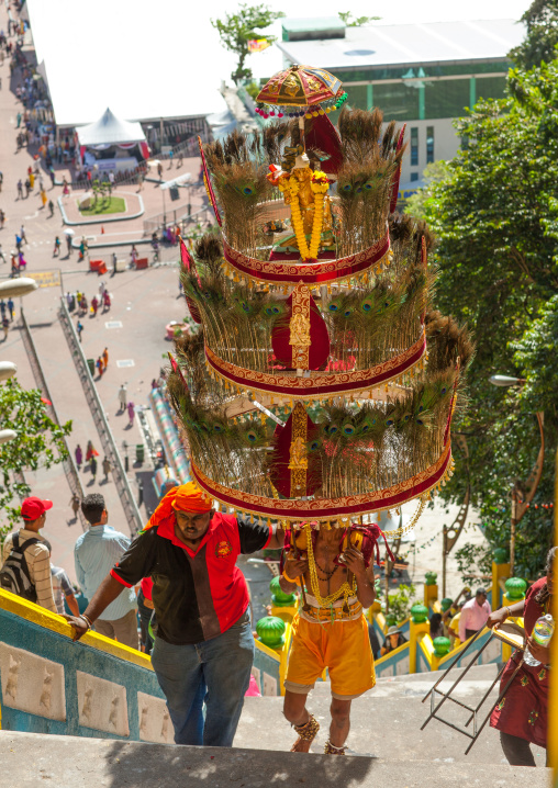 Devotee Kavadi Bearer Climbing Stairs At Thaipusam Hindu Religious Festival In Batu Caves, Southeast Asia, Kuala Lumpur, Malaysia